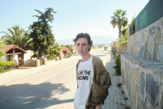 Woman walking in a coastal town