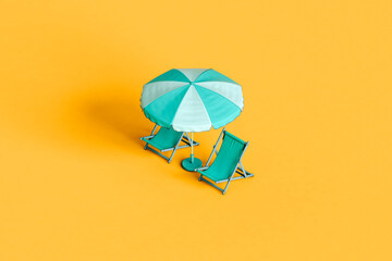 blue beach umbrellas and chairs