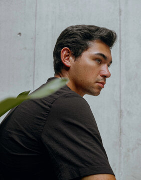 Young male looking outward 