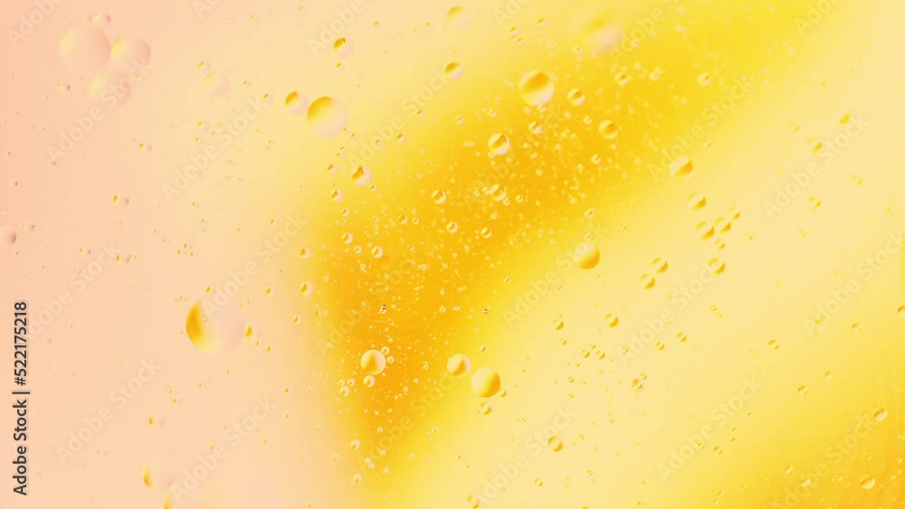 Poster real close up oil bubbles in water rotation with color gradient abstract mixing background.