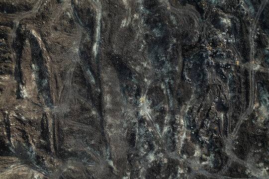 From above texture of volcano rocks and sand from lava at Mount Batur