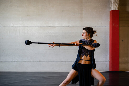 juggler with a fire baton