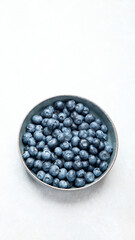 Fresh blueberry on neutral background.