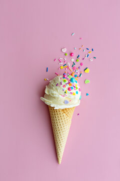 Ice cream with sugar sprinkles in a wafer cone
