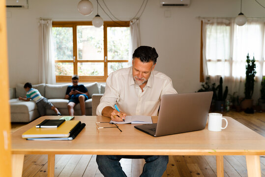 Businessman Working In Home Office