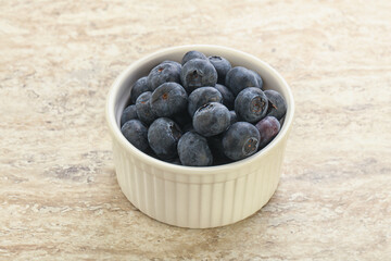 Sweet ripe blueberry heap in the bowl