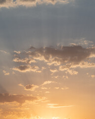 Beautiful cloudy sky during and before golden hour and sunset.