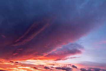 Beautiful cloudy sky during and before golden hour and sunset.
