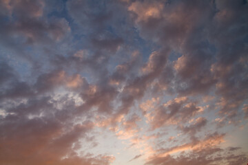 Beautiful cloudy sky during and before golden hour and sunset.