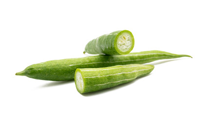 Snake gourd slices isolated on white background.