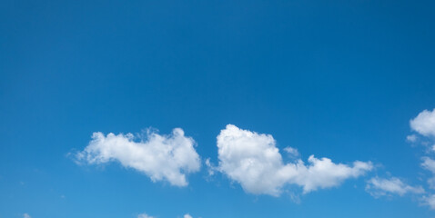 white clouds in the blue sky. cumulus.