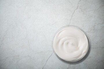 Face cream moisturiser, glass jar on background, skincare and cosmetic, beauty product concept
