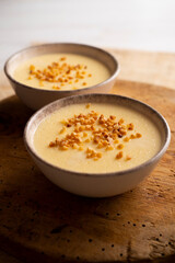 Custard with milk cream and almond crocant.