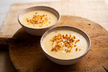 Custard with milk cream and almond crocant.