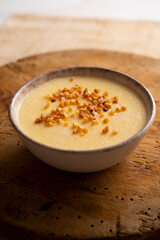 Custard with milk cream and almond crocant.