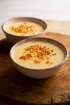 Custard with milk cream and almond crocant.