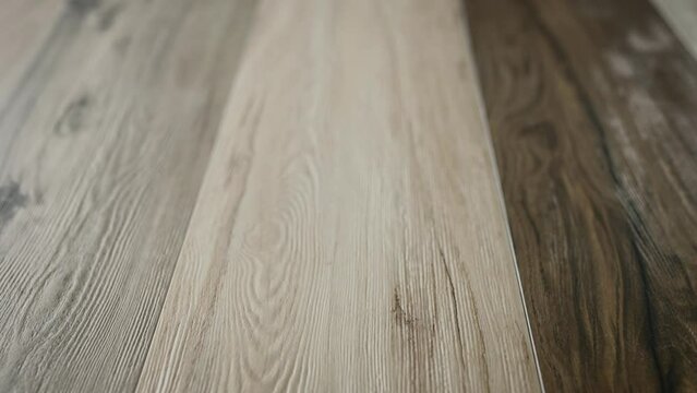 Textures and pattern of ceramic granite tiles with a surface imitating wooden boards.