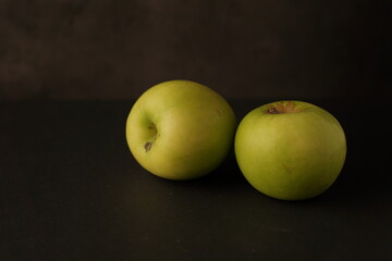 apples on a wooden table