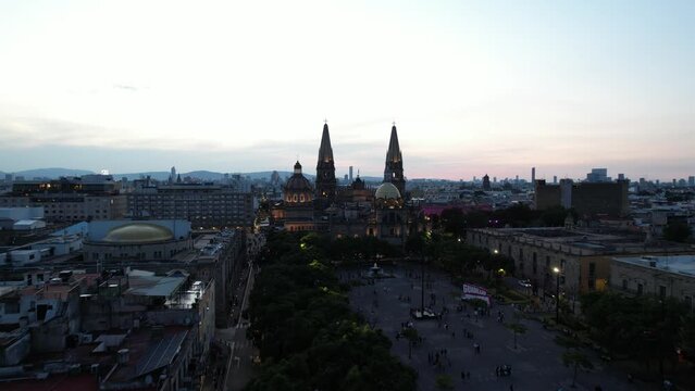 Aerial view of Guadalajara Cathedral in  Mexico during Sunset - Drone shot, zoom in 