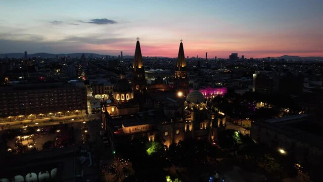 Aerial view of Guadalajara Cathedral in  Mexico during Sunset - Drone shot, zoom in 