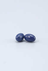 a supplement that promises to improve your health -Softgel Capsules , pill , tablets ..