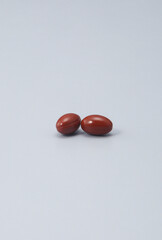 a supplement that promises to improve your health -Softgel Capsules , pill , tablets ..