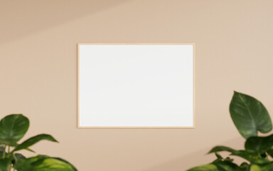 Clean and minimalist front view horizontal wooden photo or poster frame mockup hanging on the wall with blurry plant. 3d rendering.