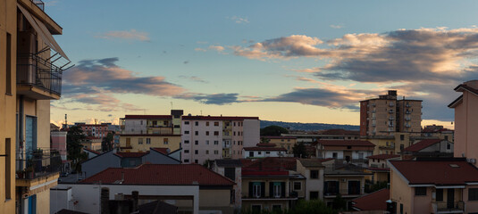 panoramica city skyline with clouds in bad weather of Aversa at sunset