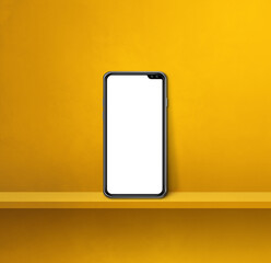 Mobile phone on yellow wall shelf. Square background