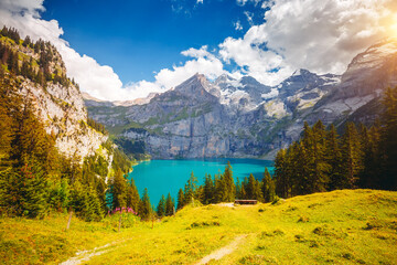 Attractive summer view of the lake Oeschinensee in sunny day. Switzerland, Europe.