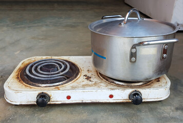 Close up on an old two plate cooking electric stove