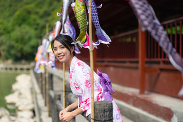 Japanese woman wear yukata at park