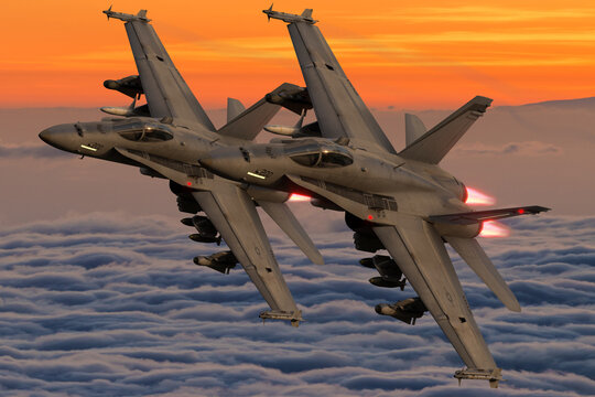 Boeing F / A-18E / F Super Hornet in flight above the clouds