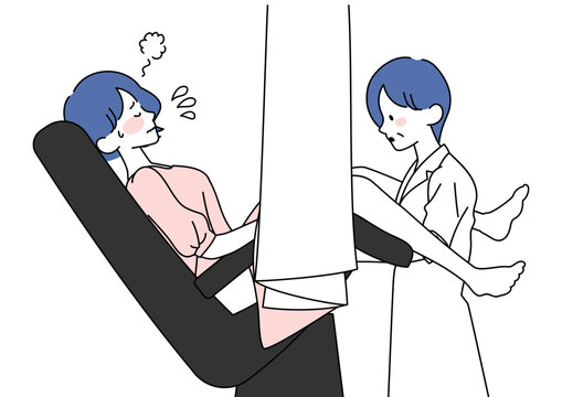 婦人科の内診を受ける女性