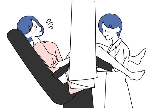 婦人科の内診を受ける女性