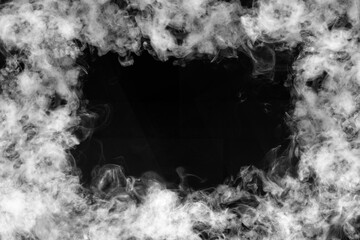 Abstract smoke texture frame over black background. Fog in the darkness concept