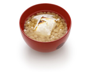 white adzuki Zenzai ( sweet beans soup with baked rice cake), a Japanese dessert