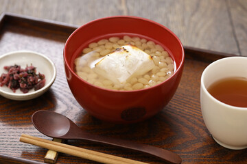 white adzuki Zenzai ( sweet beans soup with baked rice cake), a Japanese dessert