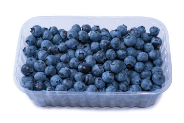 Blueberries in a plastic container isolated on white background.
