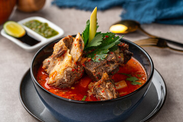 Soto Tangkar is Betawi food. The name Tangkar itself is a term for beef ribs in Betawi language. Soto Tangkar cooked in thin coconut milk soup spiced with red curry. 