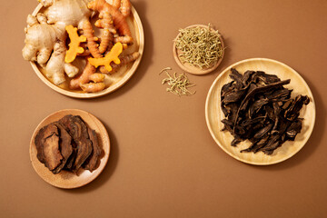 Chinese traditional medicine is used as medicine in a brown background. , for medicine advertising, photography traditional medicine content. 