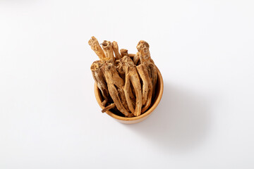 Red ginseng on white background.  This is an herbal medicine ingredient from Korea, that is good for health