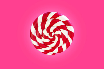 Isolated candies,spiral caramel of red and white color.A Swirling Pattern Of Sweet Caramel.Twisted...