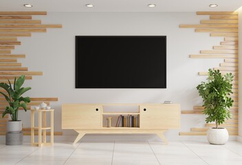 TV on the wall in the living room decorated with a table and flower pots on the tiled floor.3d rendering.