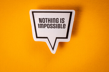 Nothing Is Impossible. Speech bubble with text on yellow background