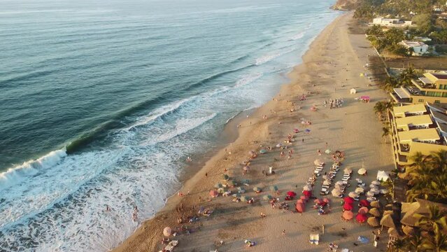 Colorful Beach Life of Tropical San Pancho at Sunset