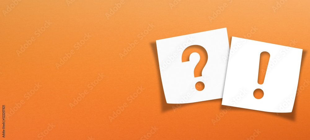 Poster note paper with exclamation mark and question mark on orange background