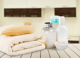 Obraz na płótnie Canvas Fresh clean towels on wooden table in bathroom.