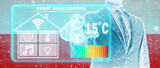 Frozen citizen of Poland adjusting heating temperature on a virtual screen of smart home...