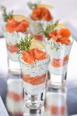 Verrine  from soft cheese cream and salmon, dill sprig and lemon slice. Aperitif appetizer's